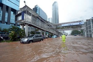 印尼首都雅加達遭洪水侵襲。（圖源：AFP）