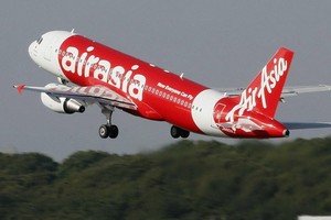 圖為亞洲航空的一架客機在起飛。（圖源：互聯網）