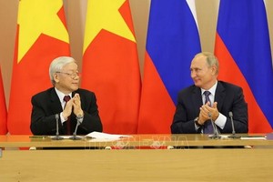 黨中央總書記、國家主席阮富仲（左）與俄羅斯總統普京。（圖源：越通社）