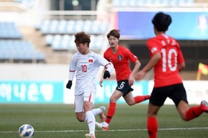 越南(白衣)與韓國比賽一瞥。（圖源：互聯網）