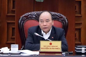 政府總理阮春福主持政府常務會議。（圖源：越通社）