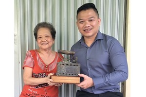 百年熨斗 熨出了絲絲暖意