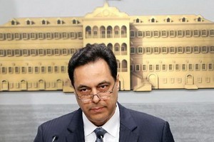 3月7日，在黎巴嫩貝魯特，黎巴嫩總理哈桑·迪亞卜發表電視講話。 （圖源：AP）