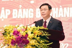 河內市市委書記王廷惠在會上致詞。（圖源：越通社）