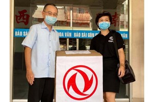 東風風行汽車向報販贈送口罩