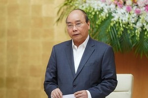 政府總理阮春福在會議上致開幕詞。（圖源：VGP）