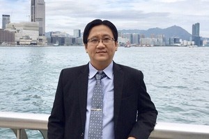 華人企業家王德錢。