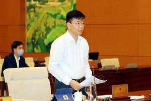 司法部長黎成隆會上報告。（圖源：越通社）