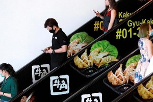 新加坡疫情期間的一處商場。（圖源：路透社） 