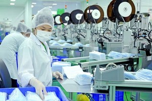 圖為醫用口罩生產車間。（圖源：光輝）