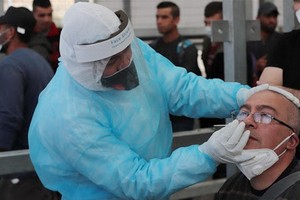 以色列將向巴勒斯坦提供約 2.3 億美元貸款以彌補巴方因新冠疫情出現的財政收入下滑。（圖源：新華社）