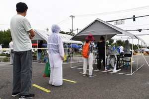 位於北京市豐台區新村街道的一處臨時核酸採樣點。（圖源：新華社）