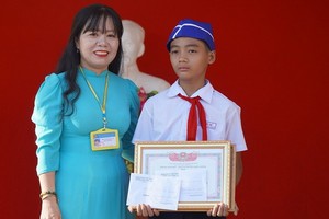 隆安初中學校六年級1班學生范仲達獲表彰。（圖源：武匯）