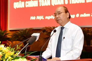 政府總理阮春福出席會議並發表指導意見。（圖源：光孝）