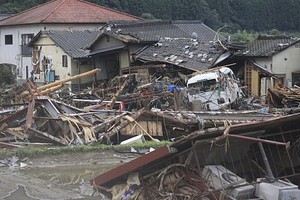 暴雨重創日本九州熊本縣，圖為災情最慘重之一的球磨村。（圖源：AP）
