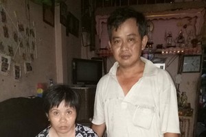 冼晉國與患上憂鬱症的妻子黃氏映梅。