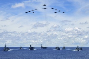 今年７月美國、日本、澳大利亞3方軍演。（圖源：Handout）