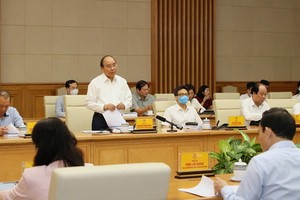 政府總理阮春福在會上發言。（圖源：光福）