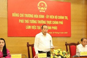 政府常務副總理張和平（中）在會上發表講話。（圖源：黎山）