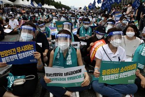 韓醫護人員集會反對政府改革。（圖源：Getty Images）