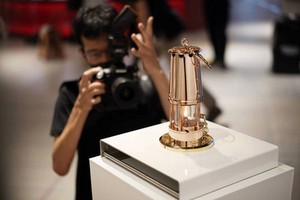 東奧聖火將對外展出至少兩個月。（圖源：AP）