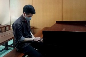 出庭受審的被告人杜文亨。（圖源：梅英）