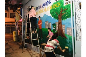 第五郡第十四坊青年美化巷道活動。