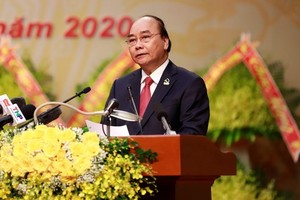 黨中央政治局委員、政府總理阮春福在大會上發表演講。（圖源：阮環）