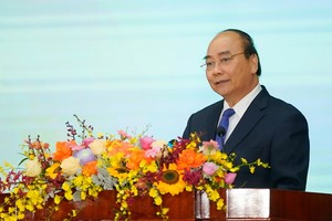 政府總理阮春福在會上發表講話。（圖源：光孝）