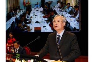 黨中央政治局委員、黨中央書記處常務書記陳國旺在科研會上致詞。