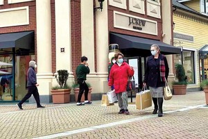 當地時間11月28日，加國溫哥華麥克阿瑟格蘭名牌購物廣場的人不多。（圖源：Getty Images）