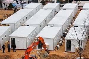 韓國首爾拍攝的用集裝箱改造中的臨時病房。（圖源：路透社）