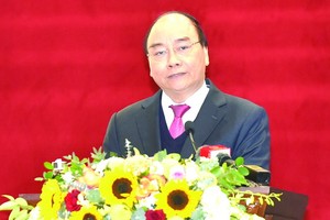 政府總理阮春福在會上發表指導意見。（圖源：VGP）