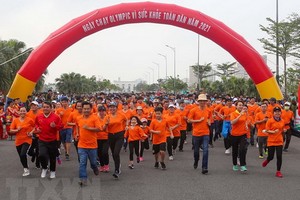 2021年為全民健康奧林匹克跑步日出發時的氣氛充滿活力。（圖源：越通社）