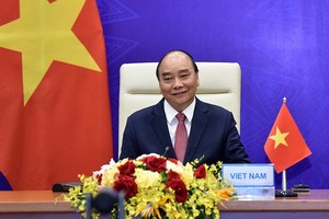 國家主席阮春福在河內以視頻方式出席領導人氣候峰會並發表重要演講。（圖源：越通社）