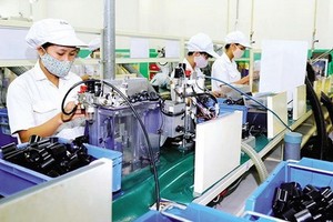 越南Toyo Denso有限責任公司（日本Toyo Denso Group的成員企業，位於南刺工業區）的本田摩托車零配件自動生產線一瞥。