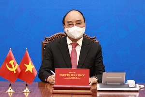 國家主席阮春福與中國國家主席習近平通電話。（圖源：越通社）