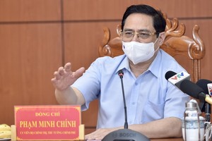 政府總理范明政在會議上發表講話。（圖源：VGP）