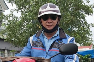 阮明仁免費把果蔬送到各慈善廚房。