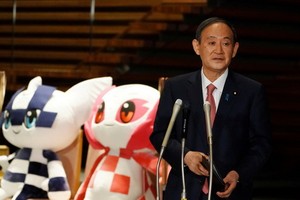 菅義偉傳可能在東京奧運會和殘奧會後，提前舉行大選。（圖源：路透社）