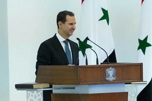 敘利亞總統巴沙爾‧阿薩德當地時間17日在首都大馬士革宣誓就職。（圖源：路透社）