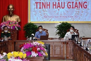 政府副總理武德膽（中）主持會議。（圖源：H. Nguyên）