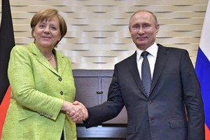 德國總理默克爾和俄羅斯總統普京。（圖源：俄羅斯新聞社圖片）