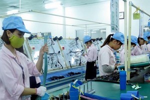 修訂法規，為企業紓困解難。（示意圖源：越河）