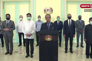 馬來西亞總理穆希丁13日發表電視直播說明。 （圖源：聯合早報）