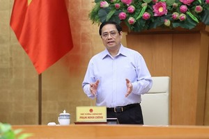 政府總理范明政在會議上發表指導意見。