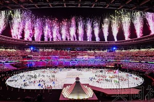 圖為東京奧運會開幕式現場一景。（圖源：共同社）
