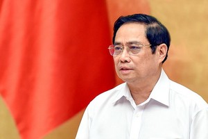 政府總理范明政：嚴懲利用募捐中飽私囊對象。（圖源：VGP）