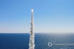 9月17日，韓國海軍公開從“島山安昌浩”號潛艇上成功試射自主研製的潛射彈道導彈（SLBM）的照片。 （圖源：韓聯社）