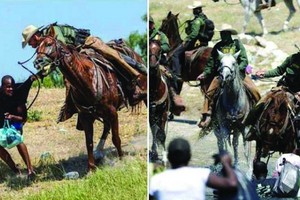 美騎警馬背上用韁繩驅趕海地難民